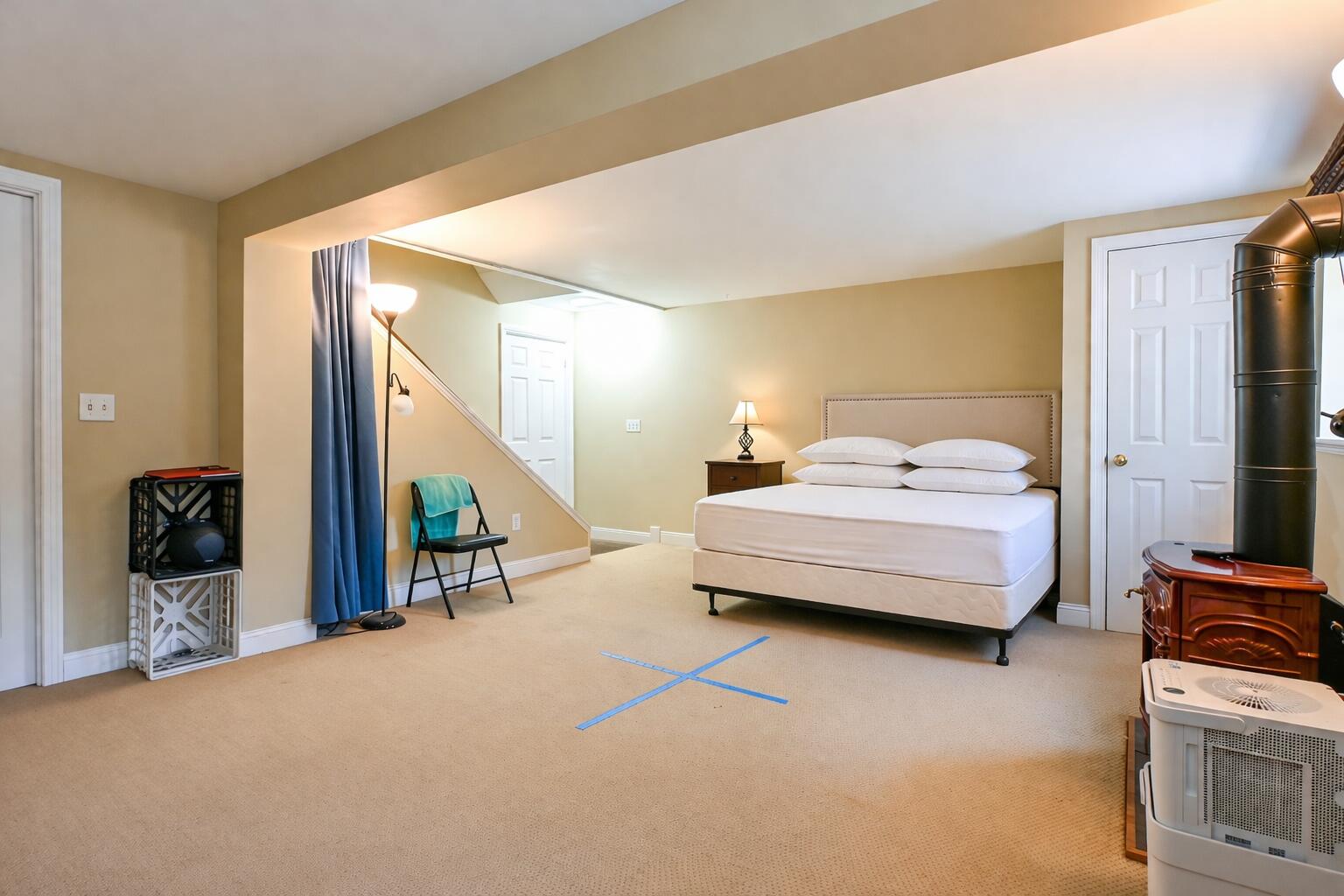 311 Milt Brown Road Standish, ME 04084 - Photo 42 of 75 Cozy basement bedroom with soft lighting