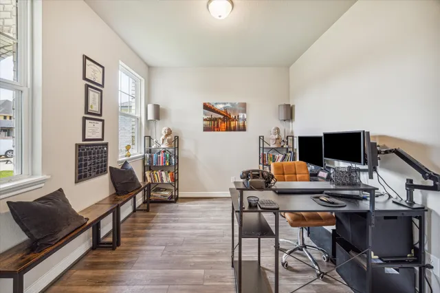 a workspace with furniture and a window