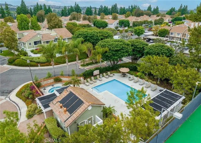 an aerial view of a house with a garden