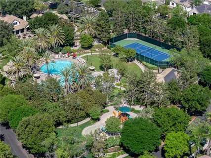 an aerial view of house with yard