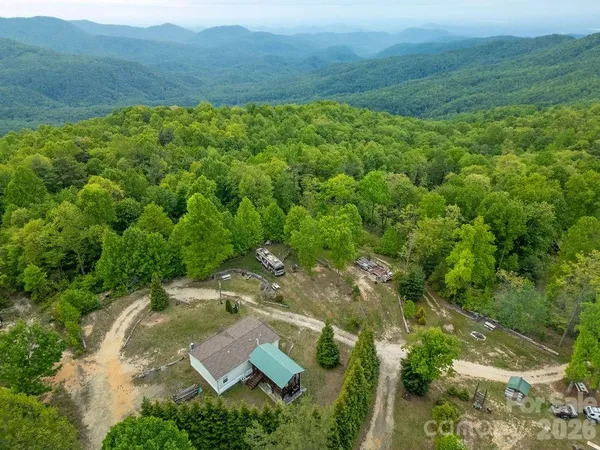 an aerial view of residential house with outdoor space
