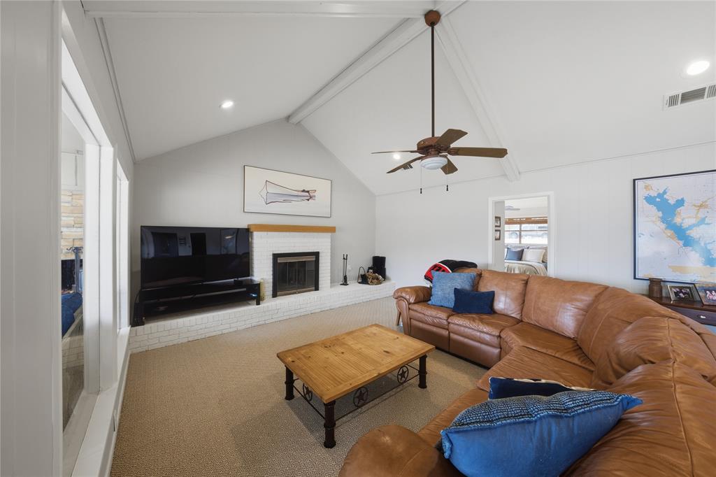 111 Ridgeoak Way Tool, TX 75143 - Photo 5 of 24 a living room with furniture and a fireplace