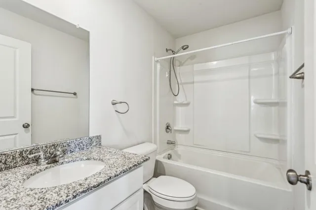 a view of a backyard of the house