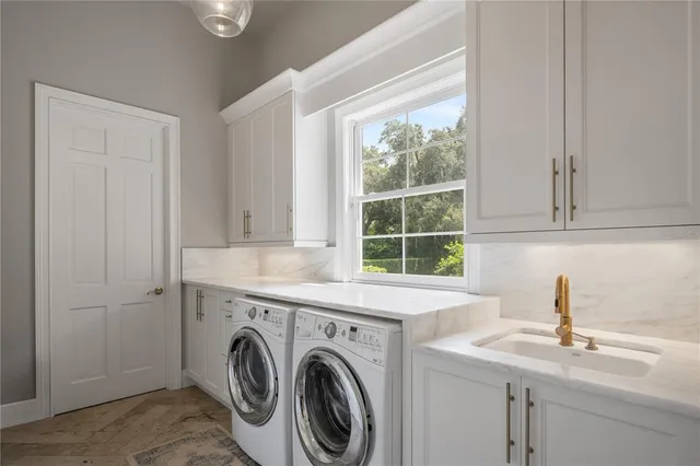 a view of a porch with furniture and garden