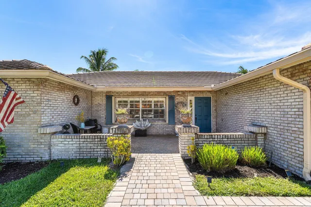 a view of an entryway with wooden door