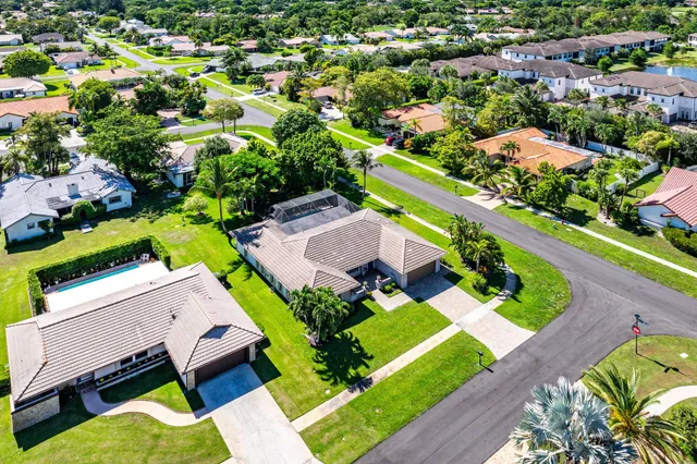 an aerial view of a house with a garden