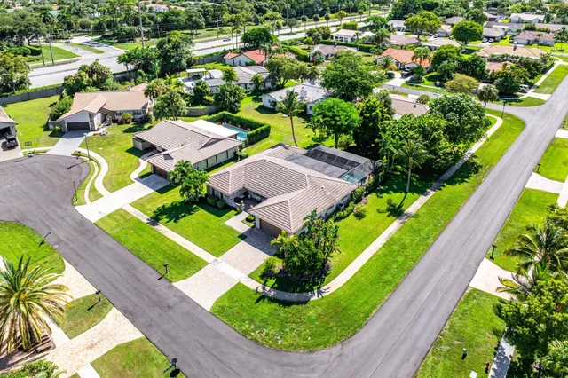 an aerial view of a house with a garden