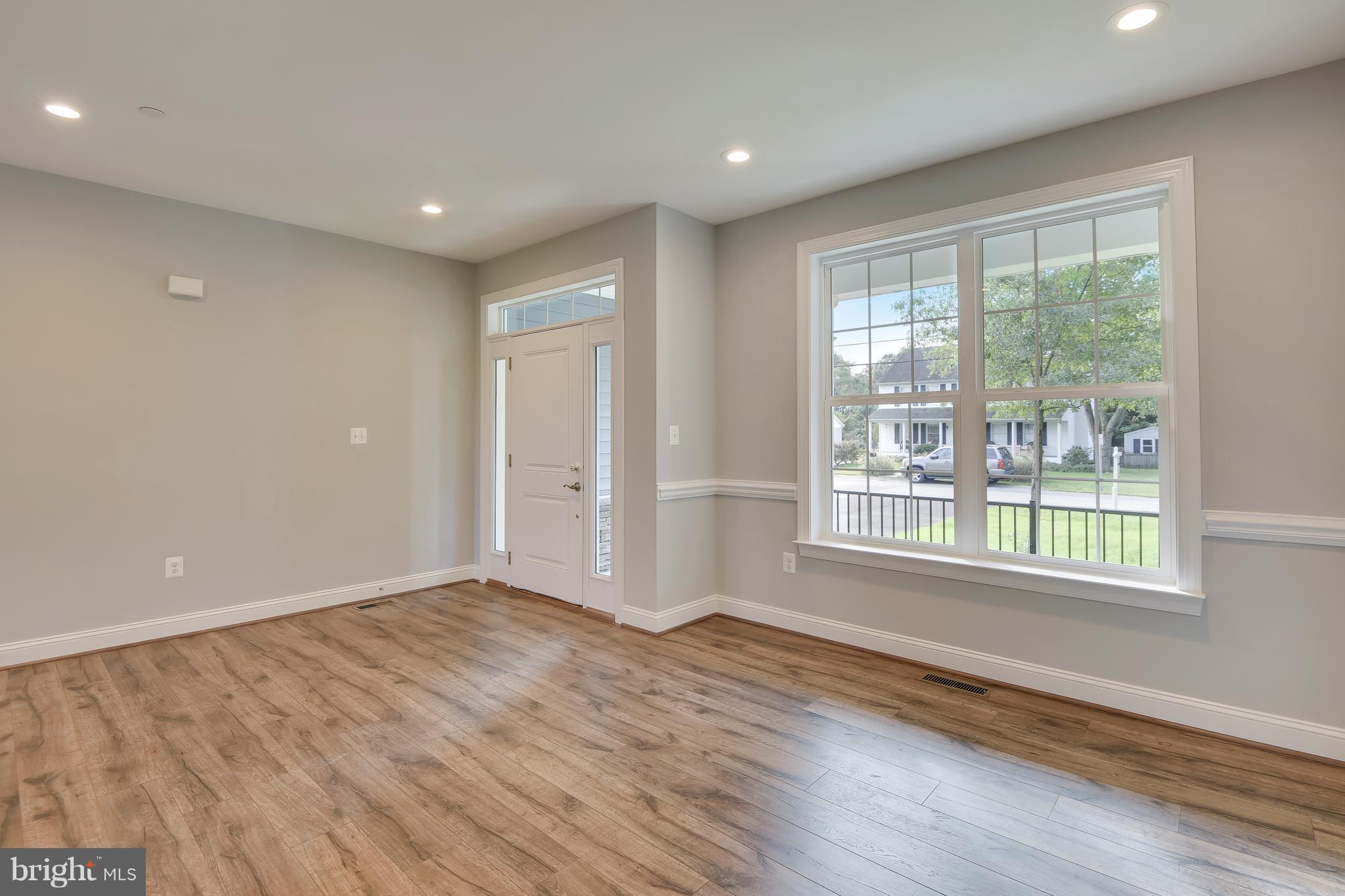 334 River Road Arnold, MD 21012 - Photo 13 of 30 Living Room has beautiful wood laminate floors.