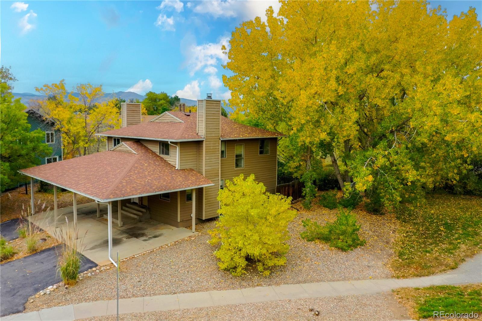 6495 Barnacle Court Boulder, CO 80301 - Photo 13 of 13 a view of a patio with table and chairs and potted plants
