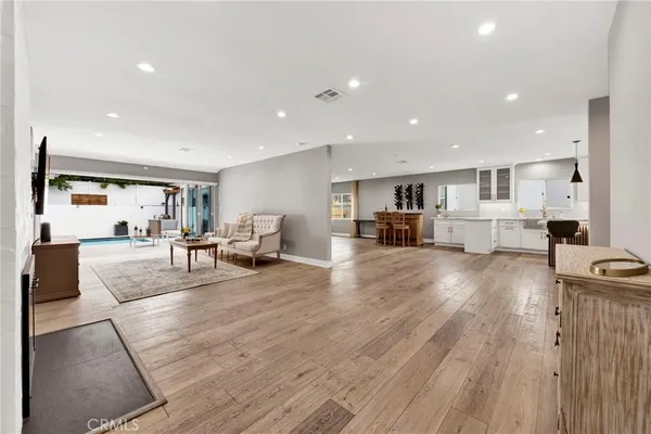a living room with furniture and a table