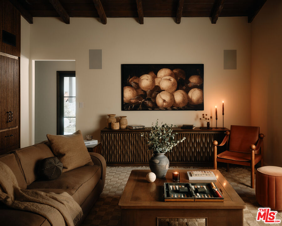 11945 Lockridge Road Studio City, CA 91604 - Photo 11 of 36 a living room with furniture and a fireplace