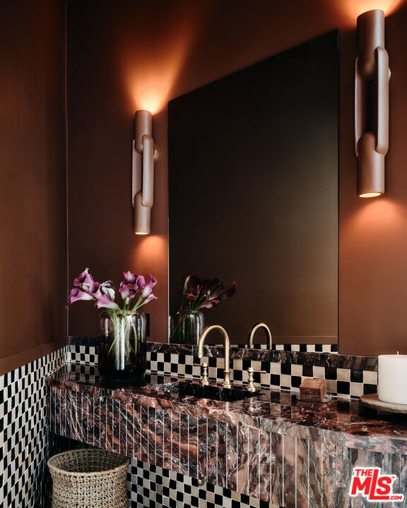 11945 Lockridge Road Studio City, CA 91604 - Photo 13 of 36 a bathroom with a sink and a mirror