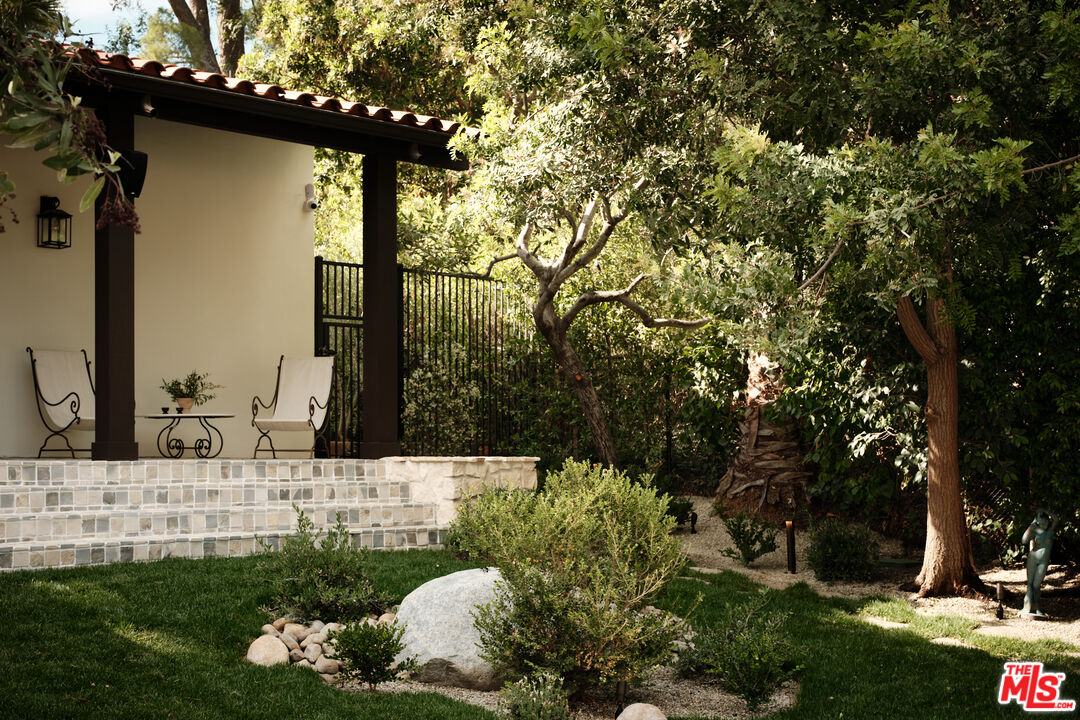 11945 Lockridge Road Studio City, CA 91604 - Photo 29 of 36 a view of a back yard of the house and green space