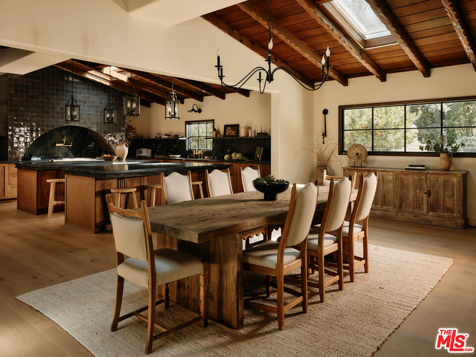 11945 Lockridge Road Studio City, CA 91604 - Photo 7 of 36 a dining room with furniture and window