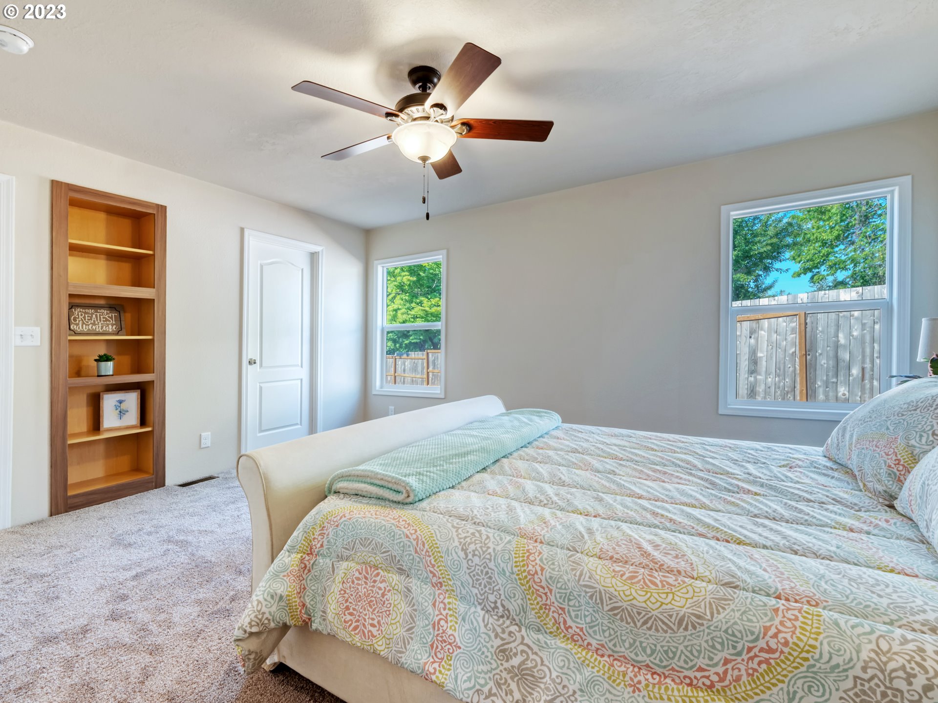 4689 Union Terrace Springfield, OR 97478 - Photo 17 of 24 a spacious bedroom with a bed and a cabinets