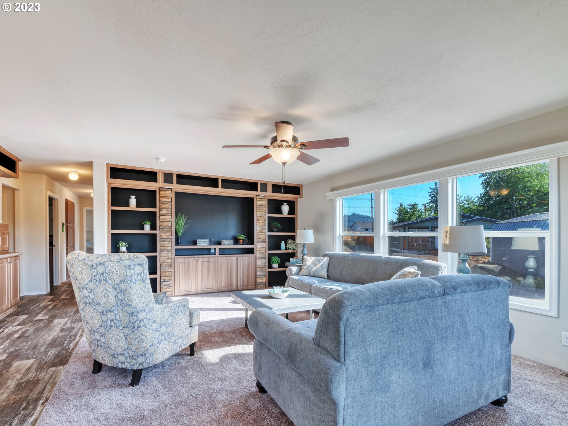 4689 Union Terrace Springfield, OR 97478 - Photo 3 of 24 a living room with furniture and a large window