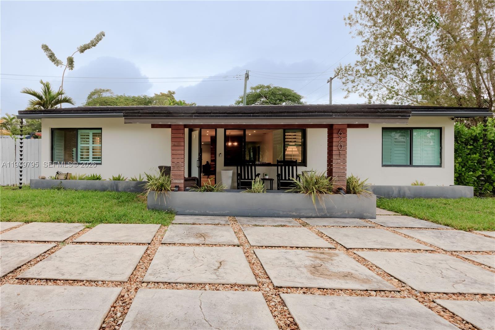front view of a house with a patio
