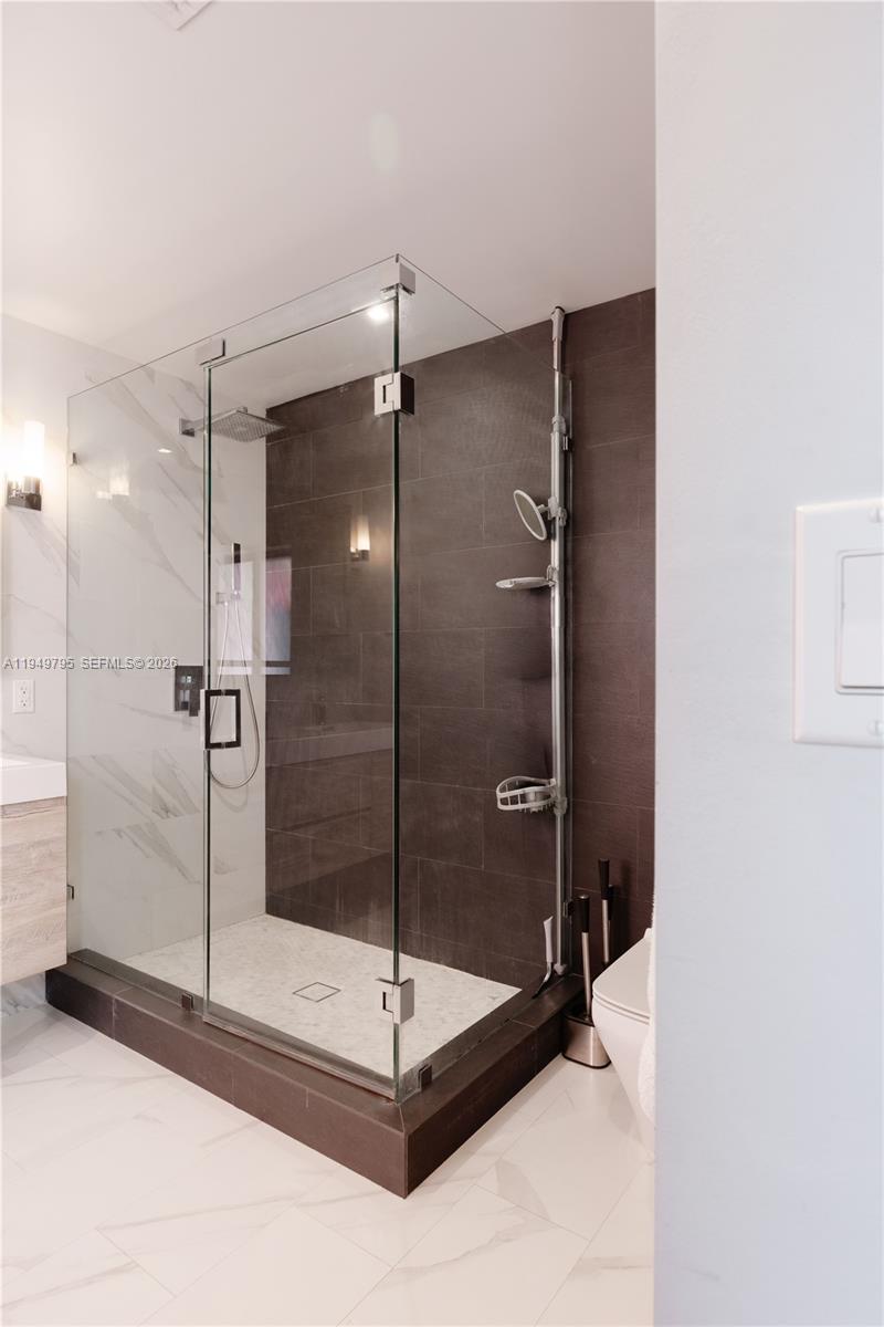 6201 Southwest 36th Street Miami, FL 33155 - Photo 13 of 43 a bathroom with a shower and a sink