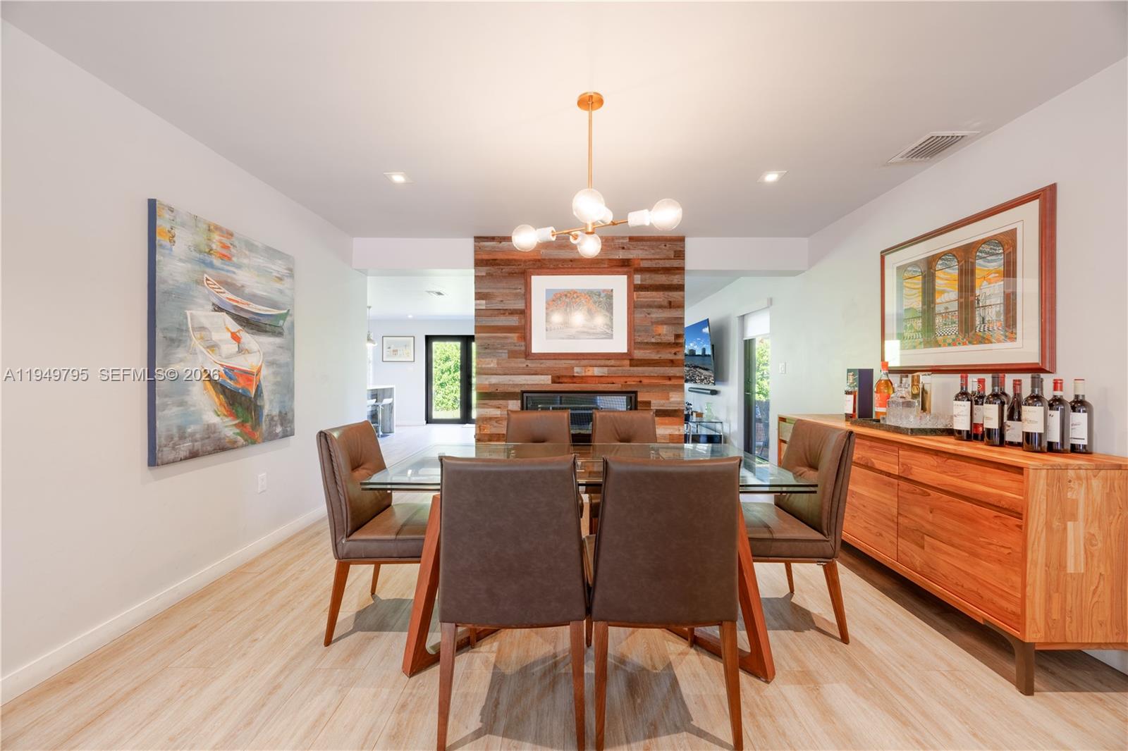 6201 Southwest 36th Street Miami, FL 33155 - Photo 20 of 43 a view of a dining room with furniture window and wooden floor