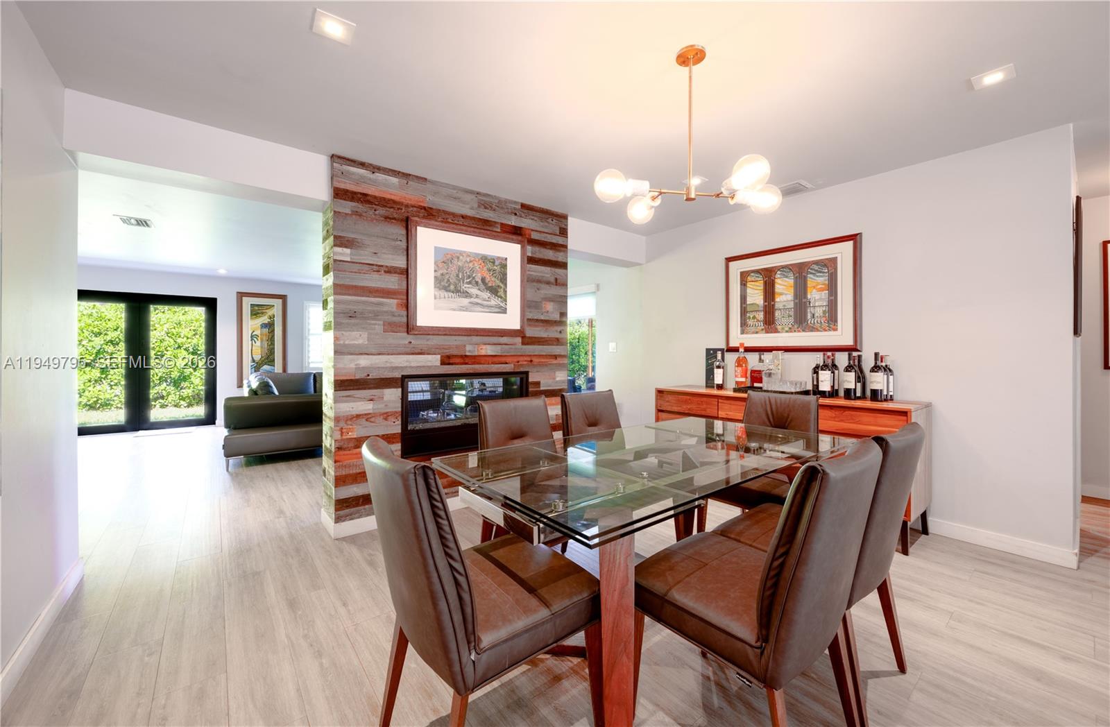 6201 Southwest 36th Street Miami, FL 33155 - Photo 21 of 43 a view of a dining room with furniture window and wooden floor