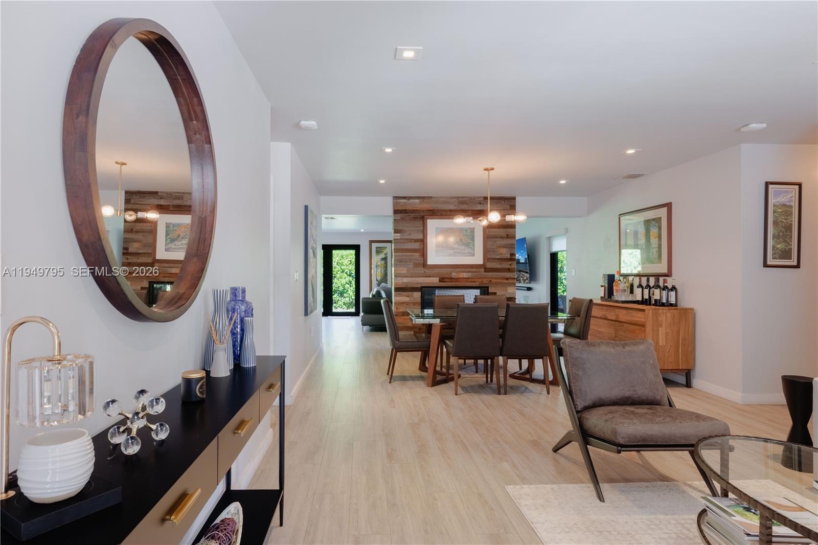 6201 Southwest 36th Street Miami, FL 33155 - Photo 3 of 43 a living room with furniture and a mirror