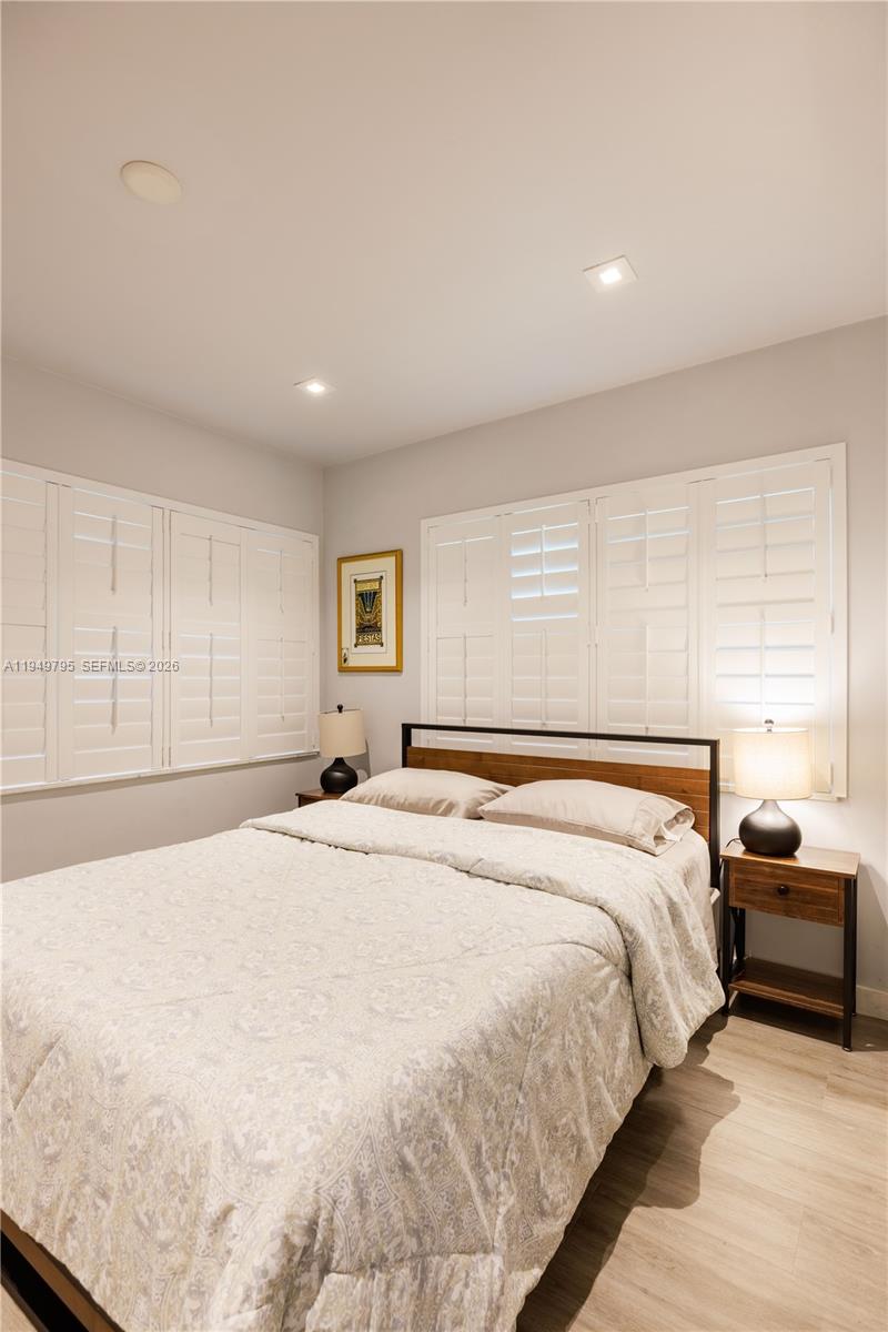 6201 Southwest 36th Street Miami, FL 33155 - Photo 34 of 43 a bedroom with a large bed and a large window