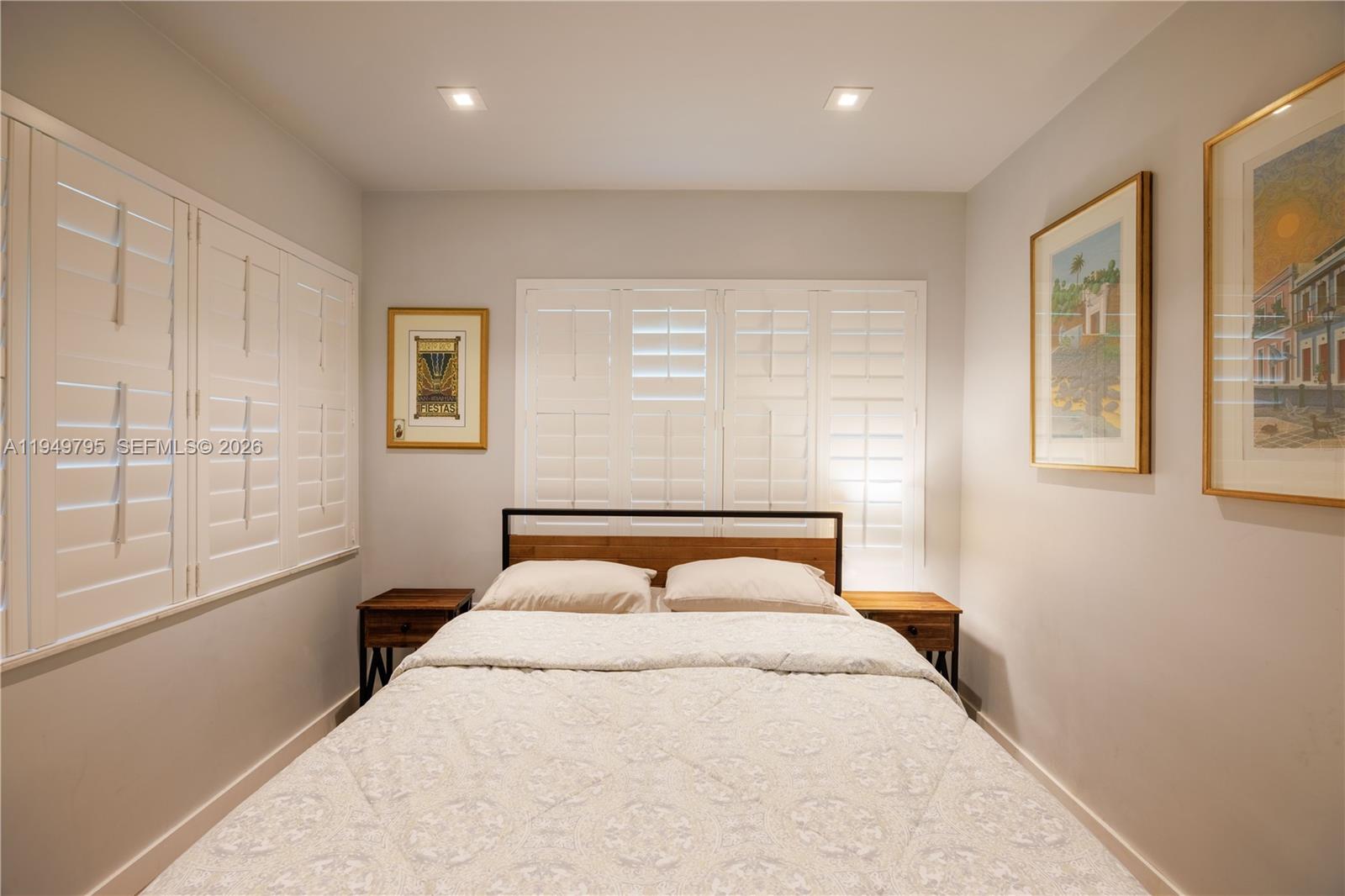 6201 Southwest 36th Street Miami, FL 33155 - Photo 35 of 43 a bedroom with a large bed and a window