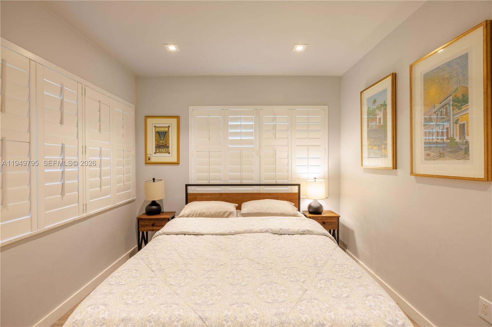 6201 Southwest 36th Street Miami, FL 33155 - Photo 36 of 43 a bedroom with a large bed and a window