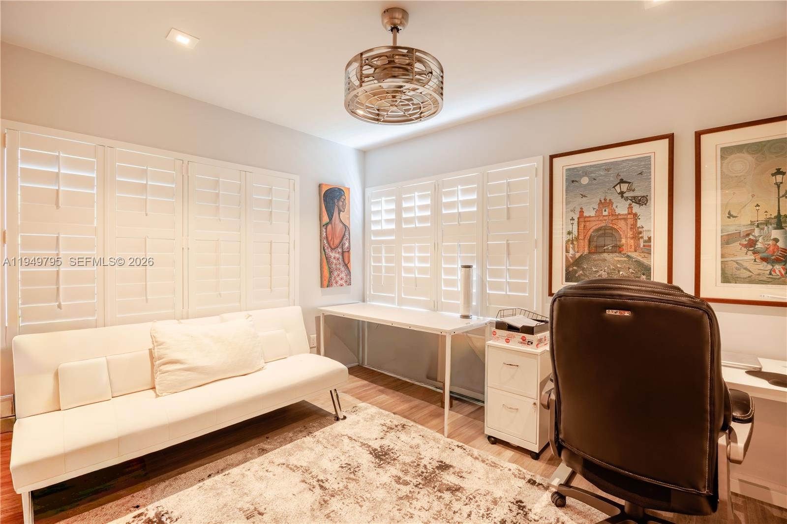 6201 Southwest 36th Street Miami, FL 33155 - Photo 38 of 43 a living room with furniture and a window