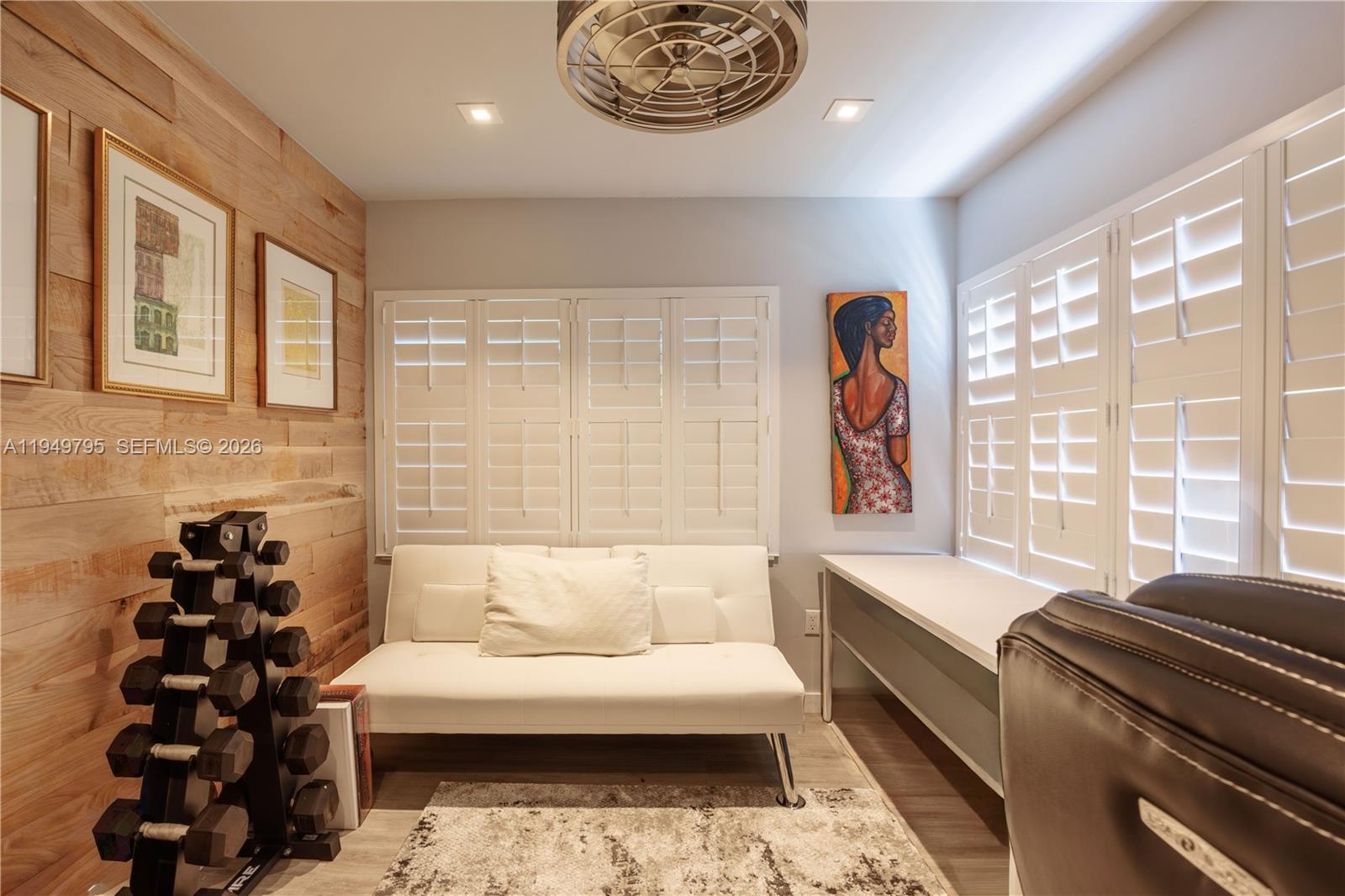 6201 Southwest 36th Street Miami, FL 33155 - Photo 39 of 43 a living room with furniture and a large window