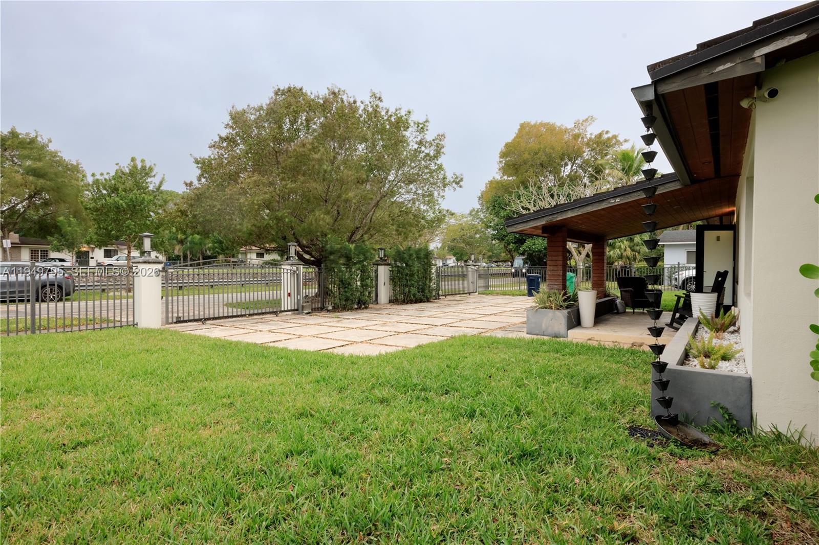 6201 Southwest 36th Street Miami, FL 33155 - Photo 41 of 43 a view of a backyard with a garden and entertaining space