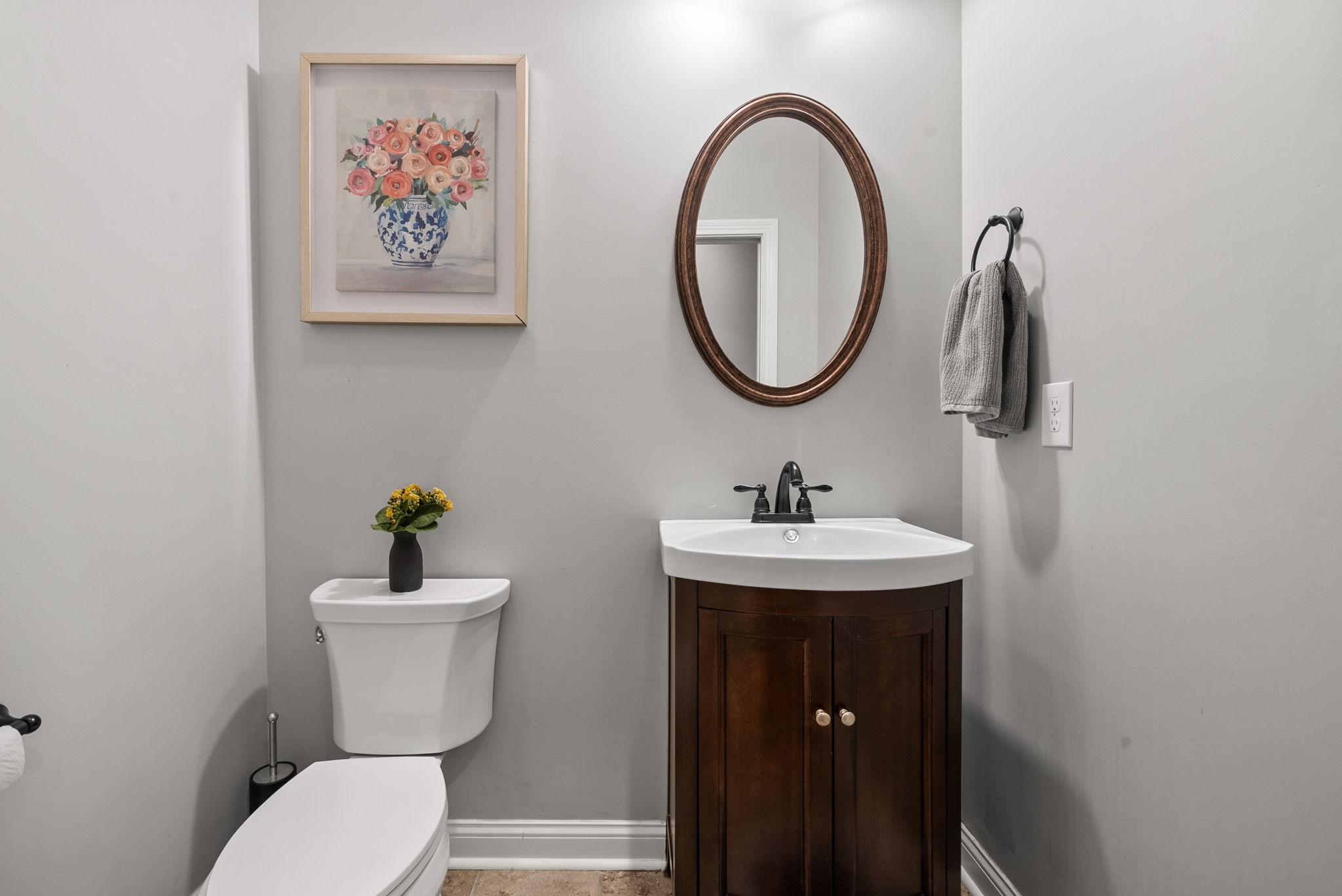 2976 Rossview Road Clarksville, TN 37043 - Photo 22 of 54 a bathroom with a toilet a sink and a mirror