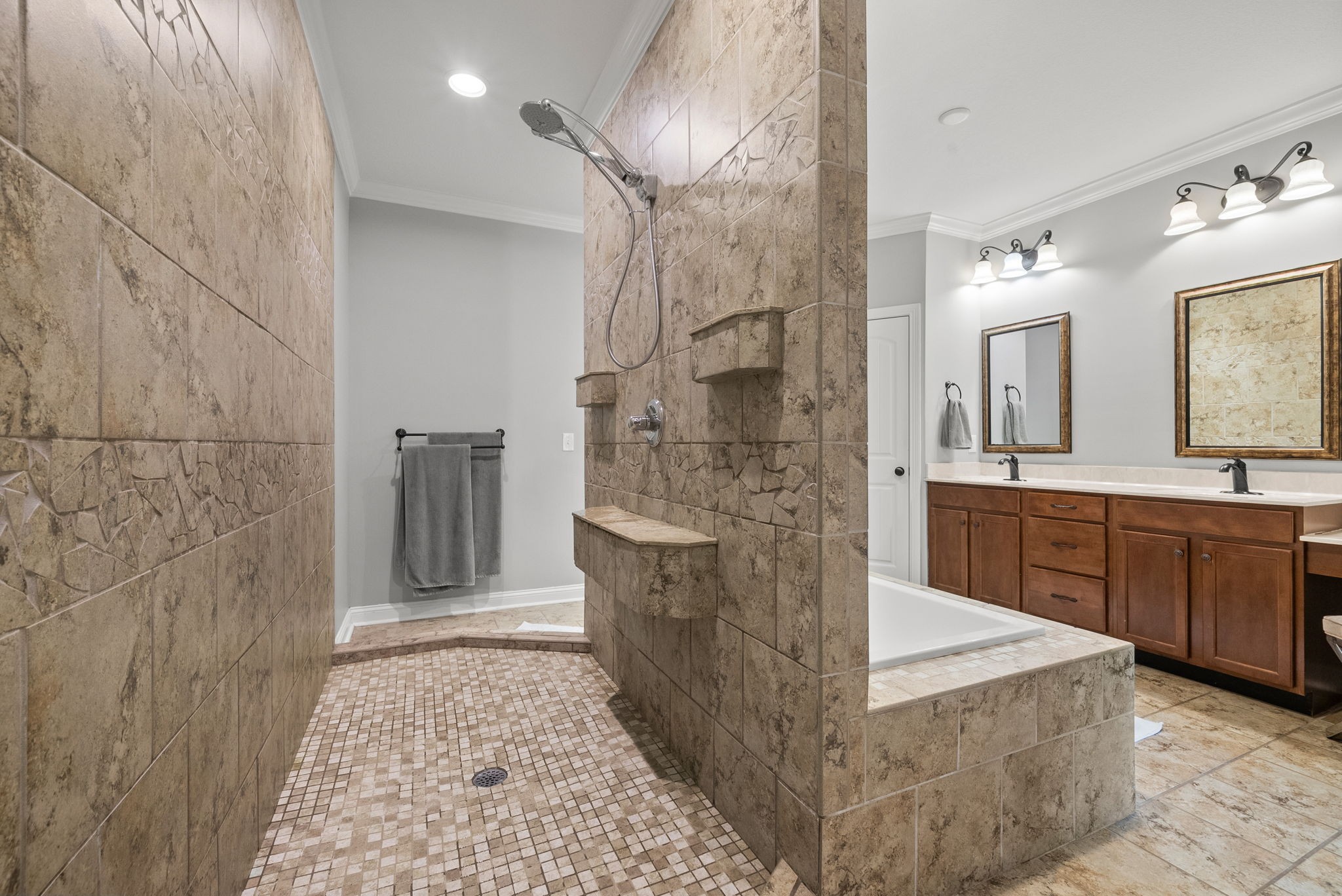 2976 Rossview Road Clarksville, TN 37043 - Photo 25 of 54 a spacious bathroom with a granite countertop sink a mirror and shower