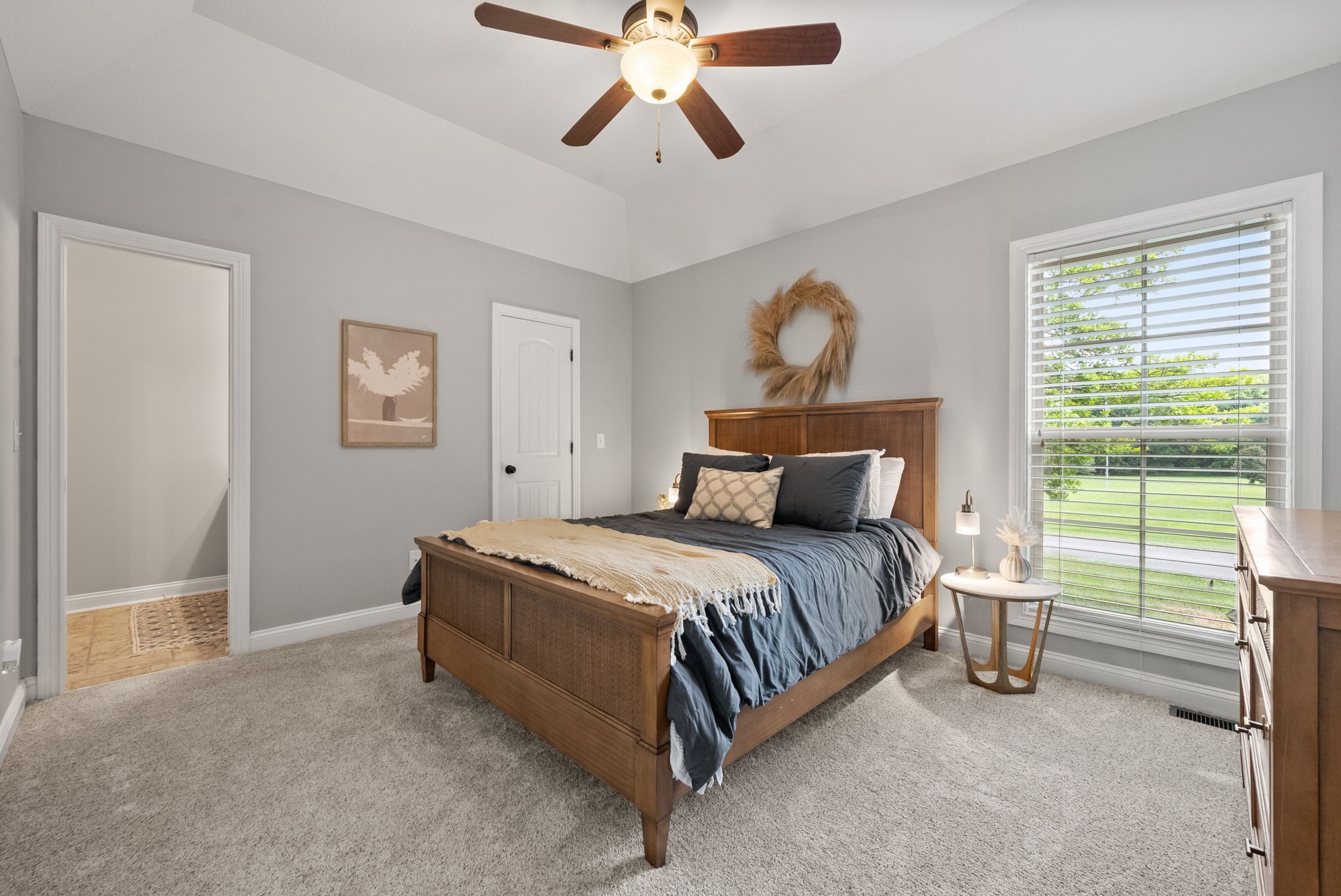 2976 Rossview Road Clarksville, TN 37043 - Photo 29 of 54 a spacious bedroom with a bed and a window