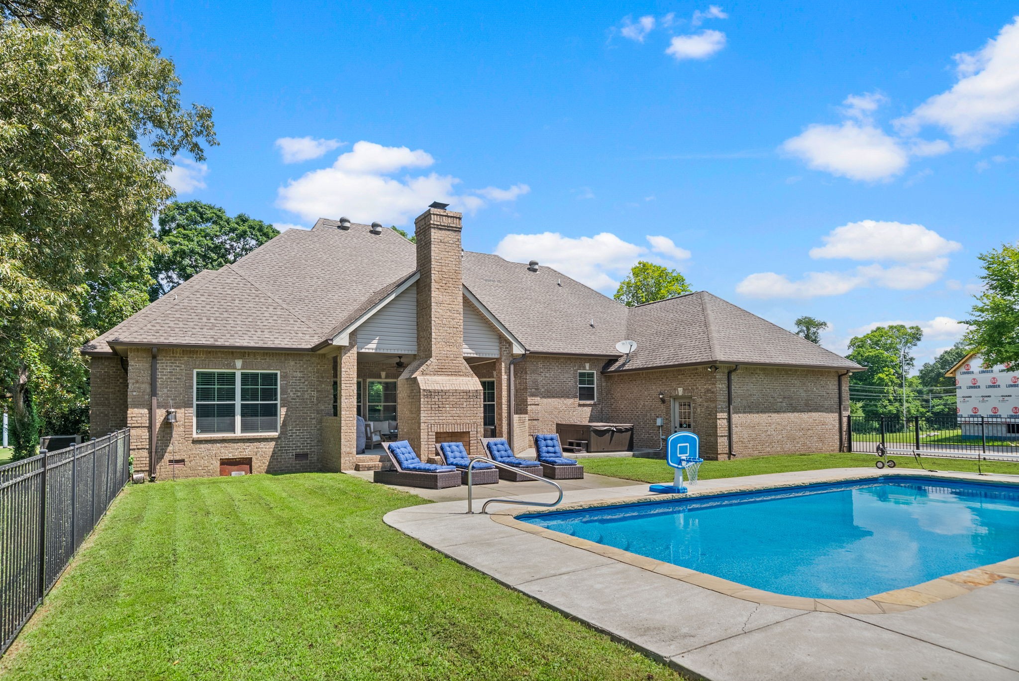 2976 Rossview Road Clarksville, TN 37043 - Photo 43 of 54 a view of a house with swimming pool and chairs