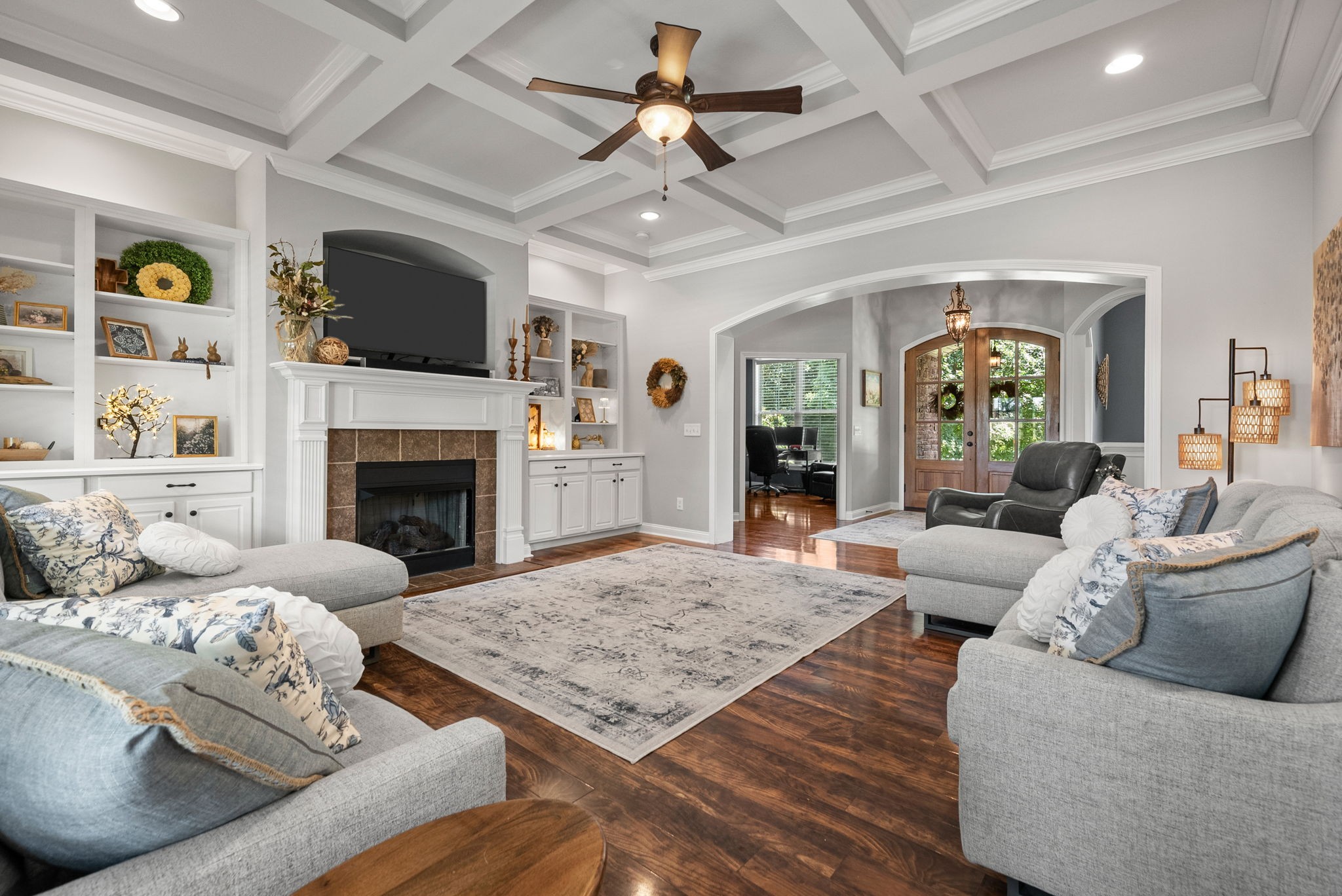 2976 Rossview Road Clarksville, TN 37043 - Photo 8 of 54 a living room with furniture fireplace and a flat screen tv