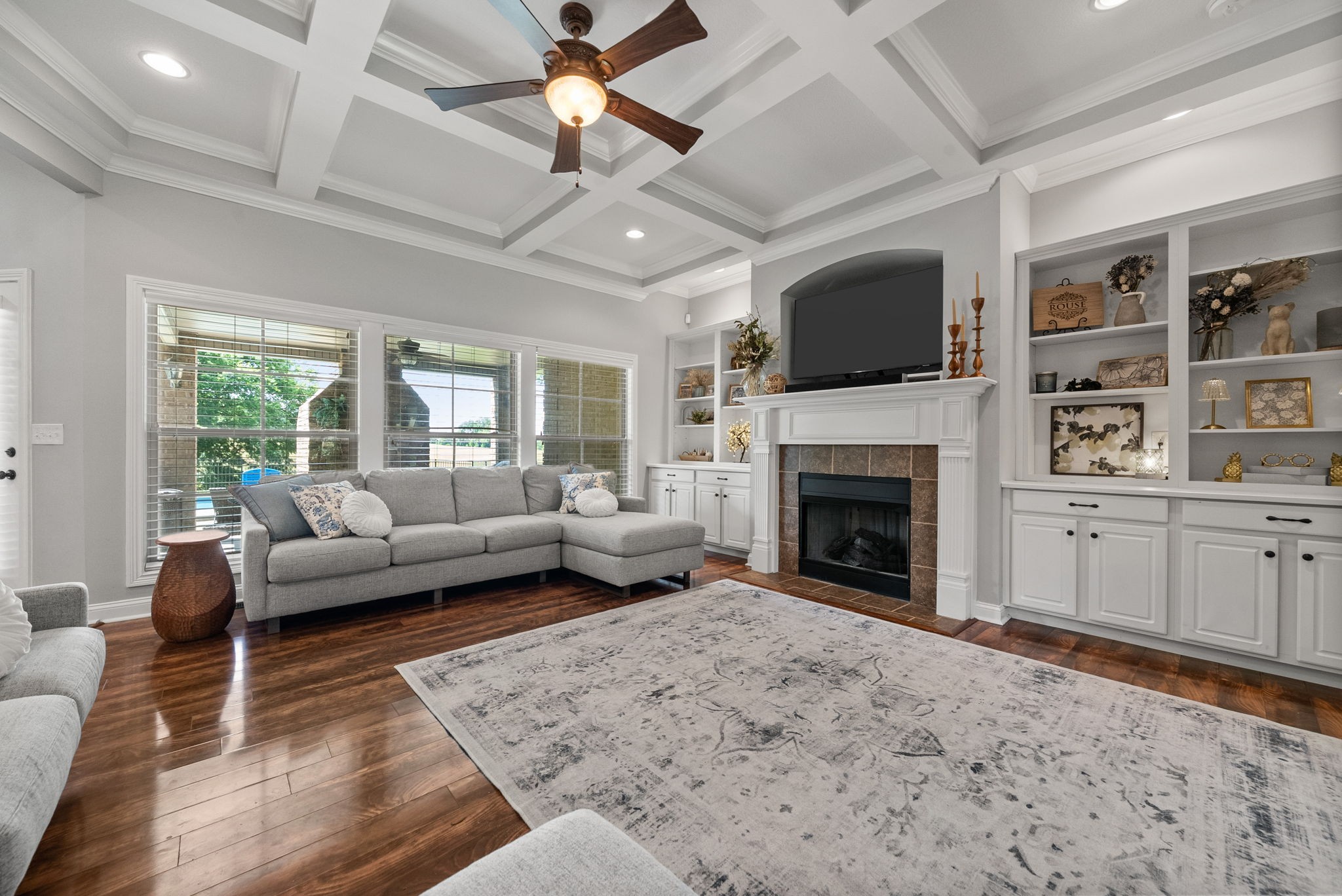 2976 Rossview Road Clarksville, TN 37043 - Photo 10 of 54 a living room with furniture a fireplace and a flat screen tv