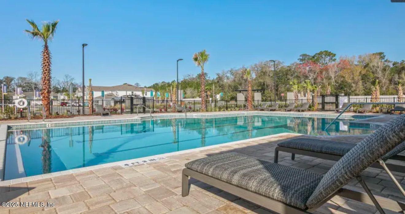 8368 Retrograde Road Jacksonville, FL 32256 - Photo 14 of 16 a view of a garden with sitting area