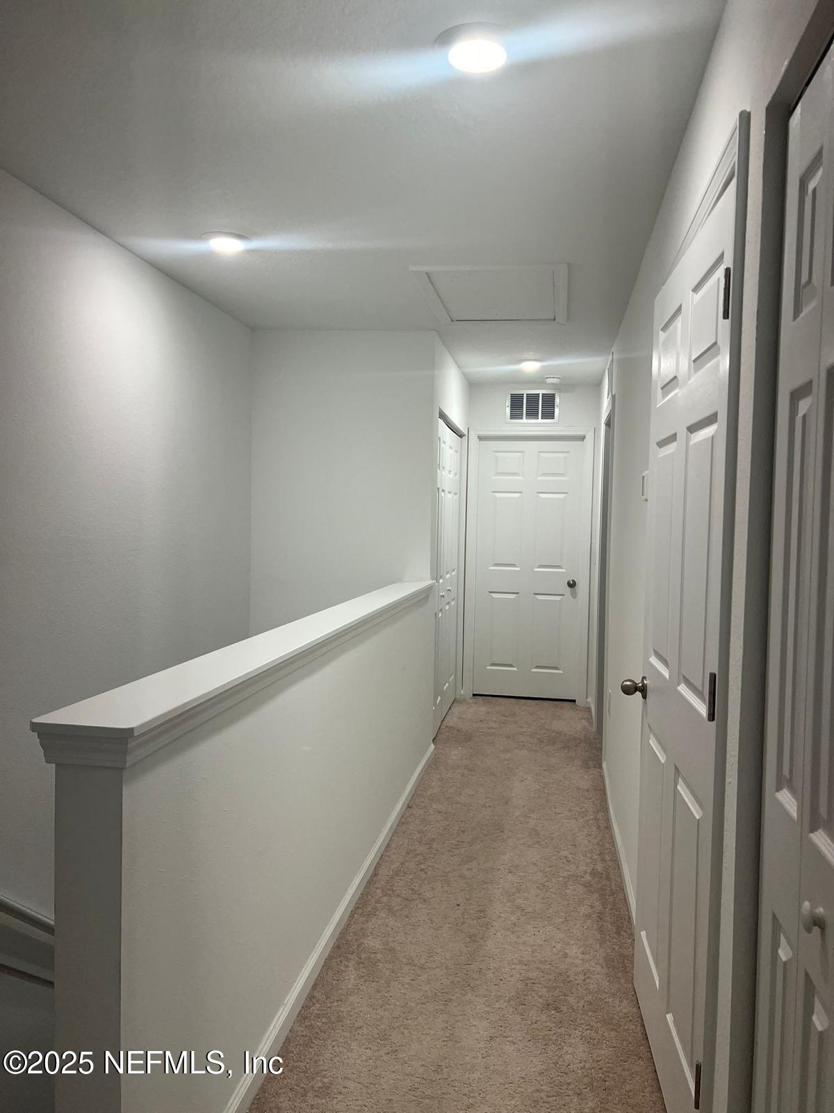 8368 Retrograde Road Jacksonville, FL 32256 - Photo 8 of 16 a view of a hallway