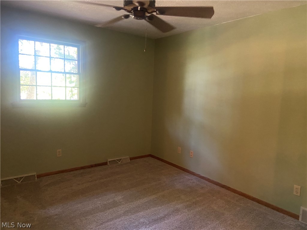 2445 South Elyria Road Wooster, OH 44691 - Photo 21 of 46 Bedroom featuring a ceiling fan