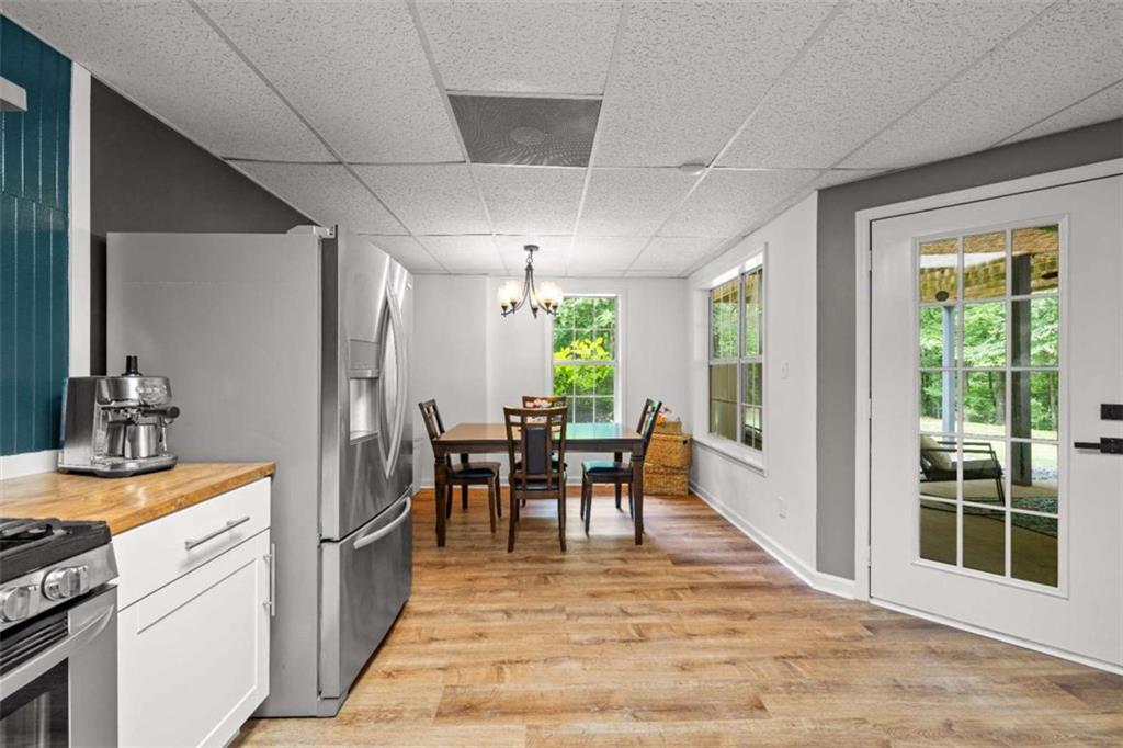 128 Byrom Road Senoia, GA 30276 - Photo 50 of 83 a view of a dining room with furniture window and outside view