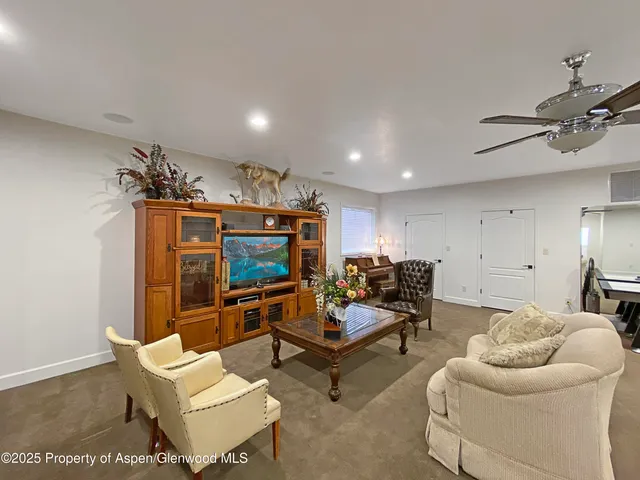 a bathroom with a bathtub and a toilet