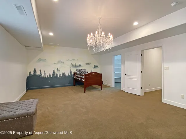 an empty room with a empty space and windows