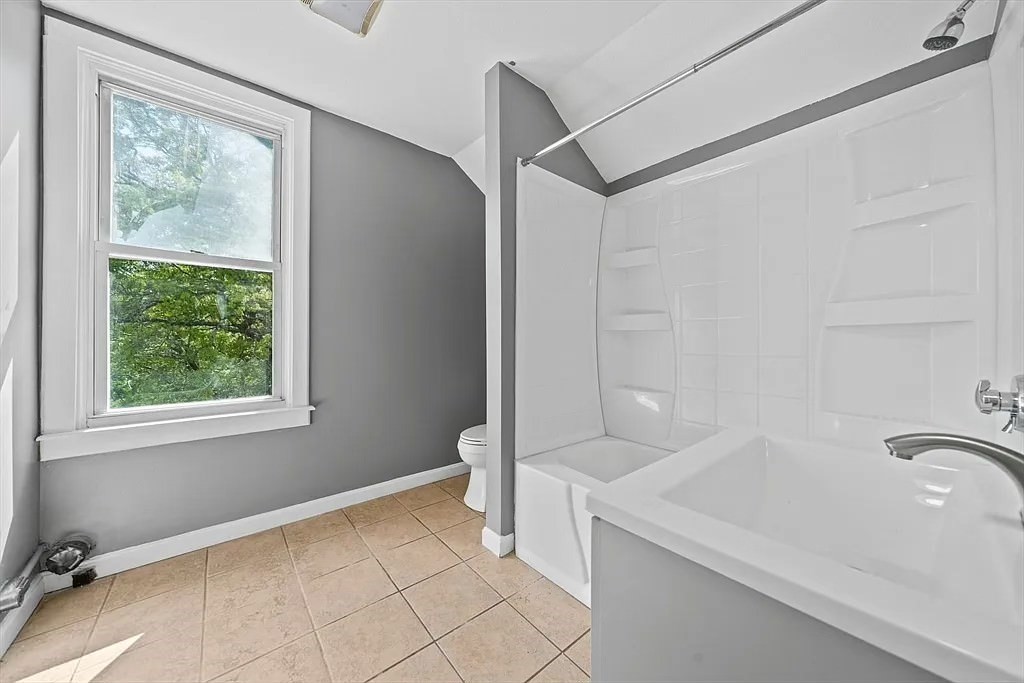 84 Tremont Street, Unit 3 Taunton, MA 02780 - Photo 9 of 9 a bathroom with a sink and a shower