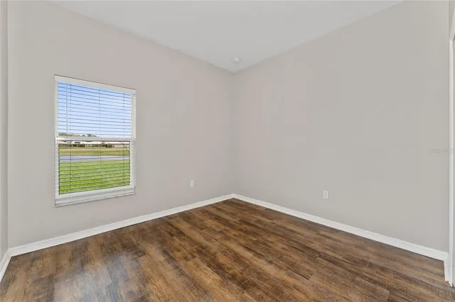 a view of a room that has a window in it