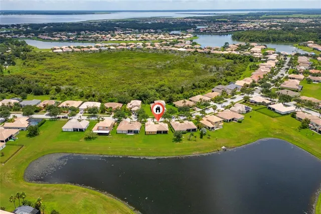 a view of a golf course with a lake