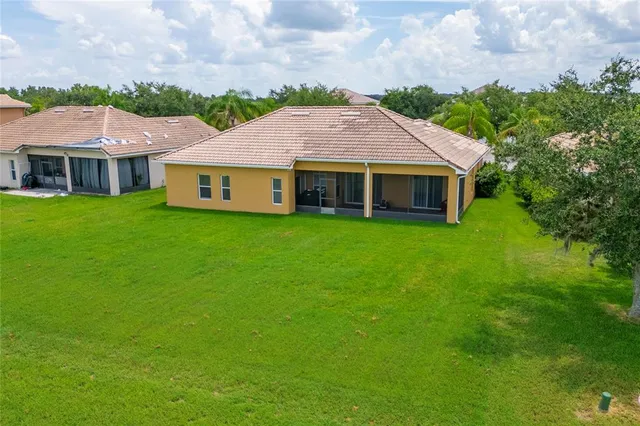a view of a house with a big yard