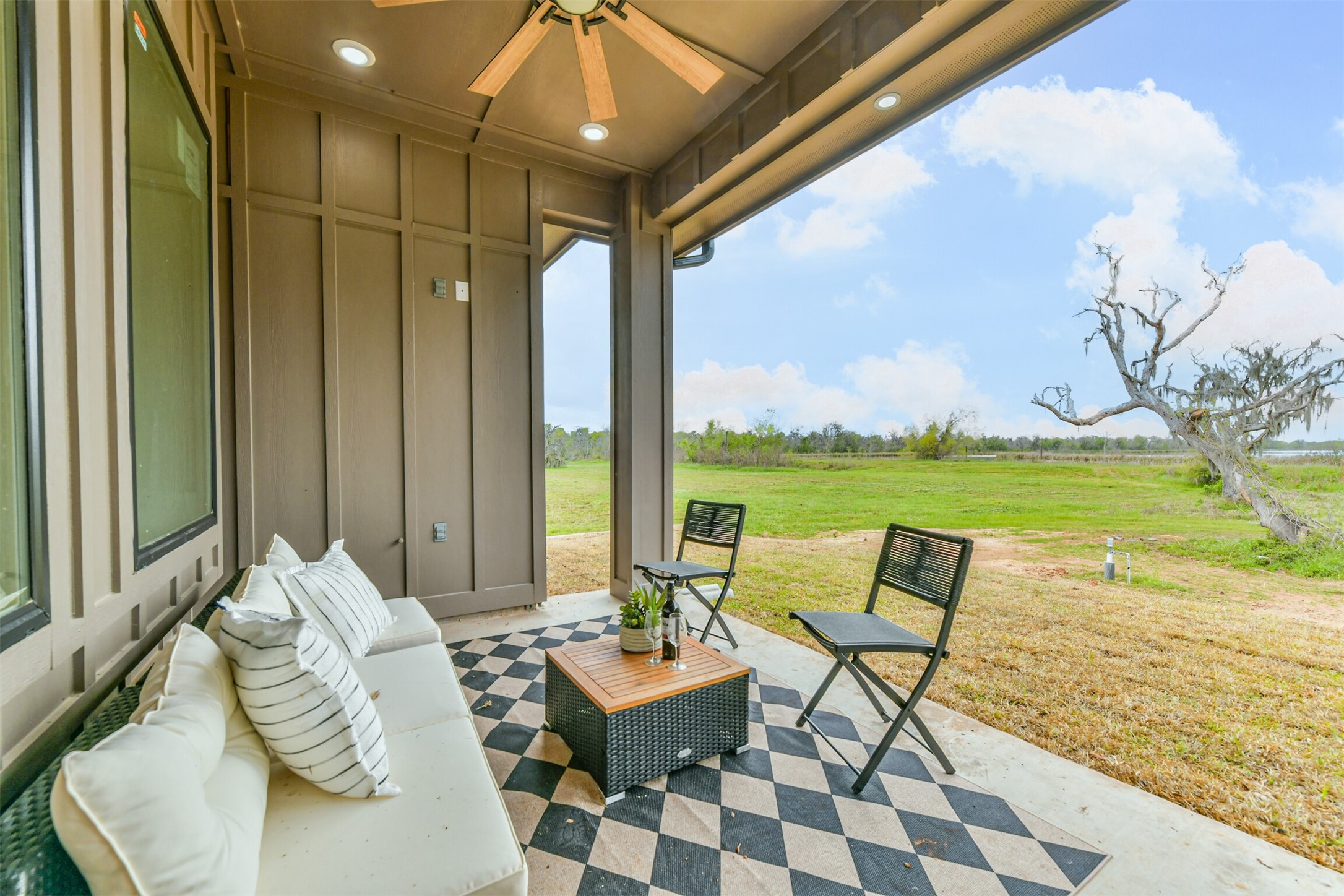 250 Pony Trail Angleton, TX 77515 - Photo 27 of 32 Relax on your backyard patio and savor stunning sunset views.