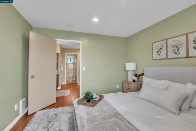 a bed room with a bed and a window