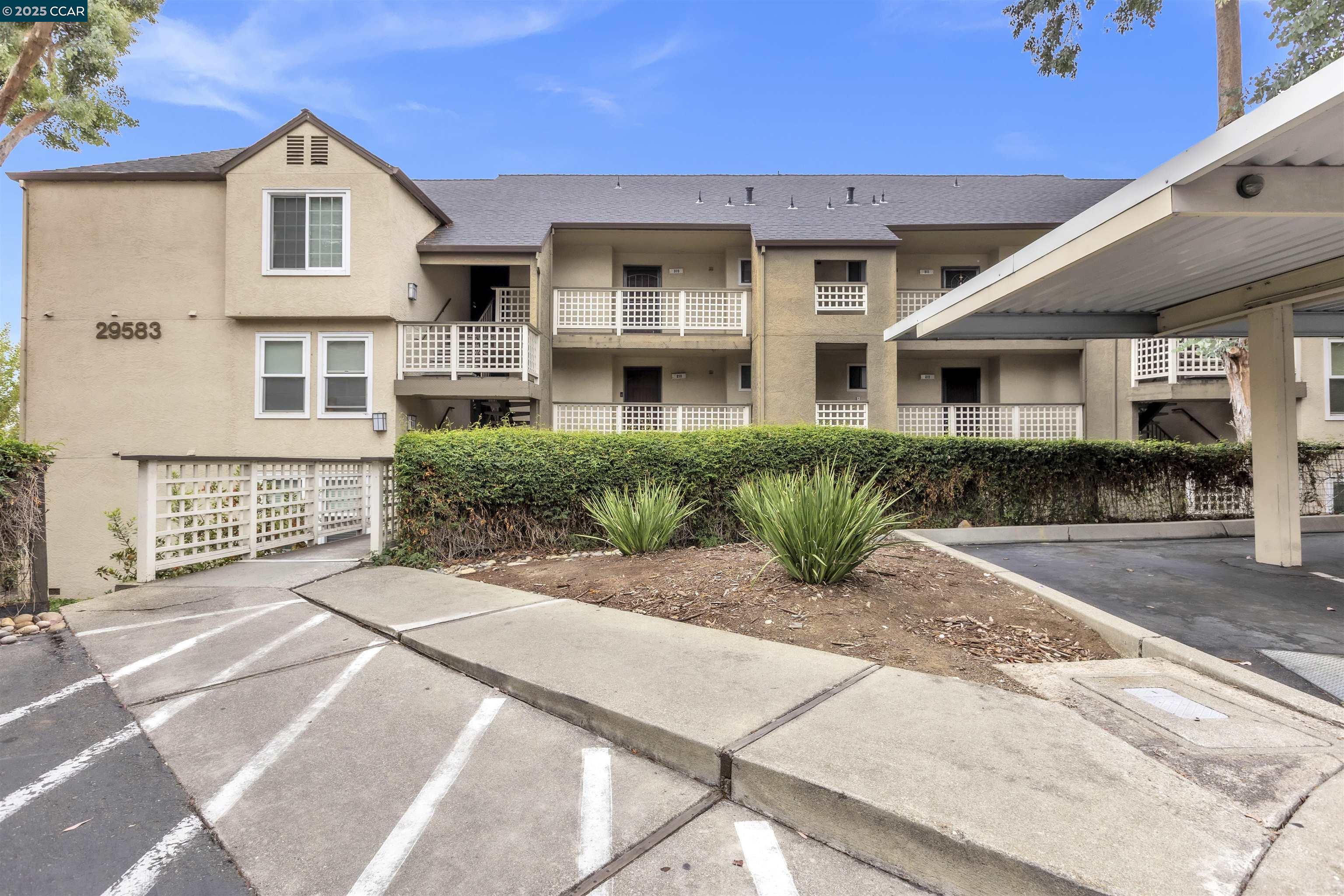 29583 Vanderbilt Street, Unit 310 Hayward, CA 94544 - Photo 15 of 22 a front view of a house with garden